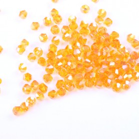 Koraliki bicone ze szkła 4mm jasnopomarańczowe 8g